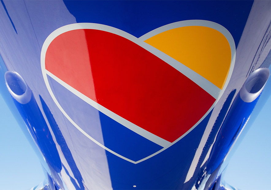 美國(guó)西南（Southwest-Airlines）航空公司vi設(shè)計(jì)-心形的航空l(shuí)ogo設(shè)計(jì).jpg